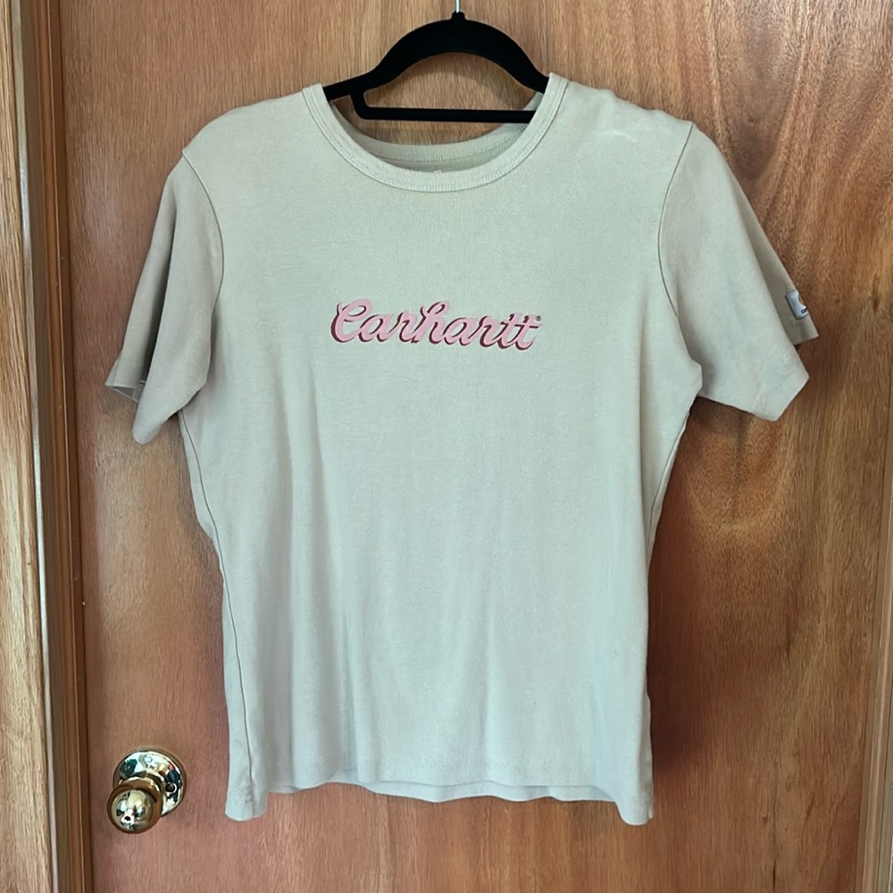 **3/$15** Women’s Carhartt t shirt. Size large. Carhartt logo o. Front.